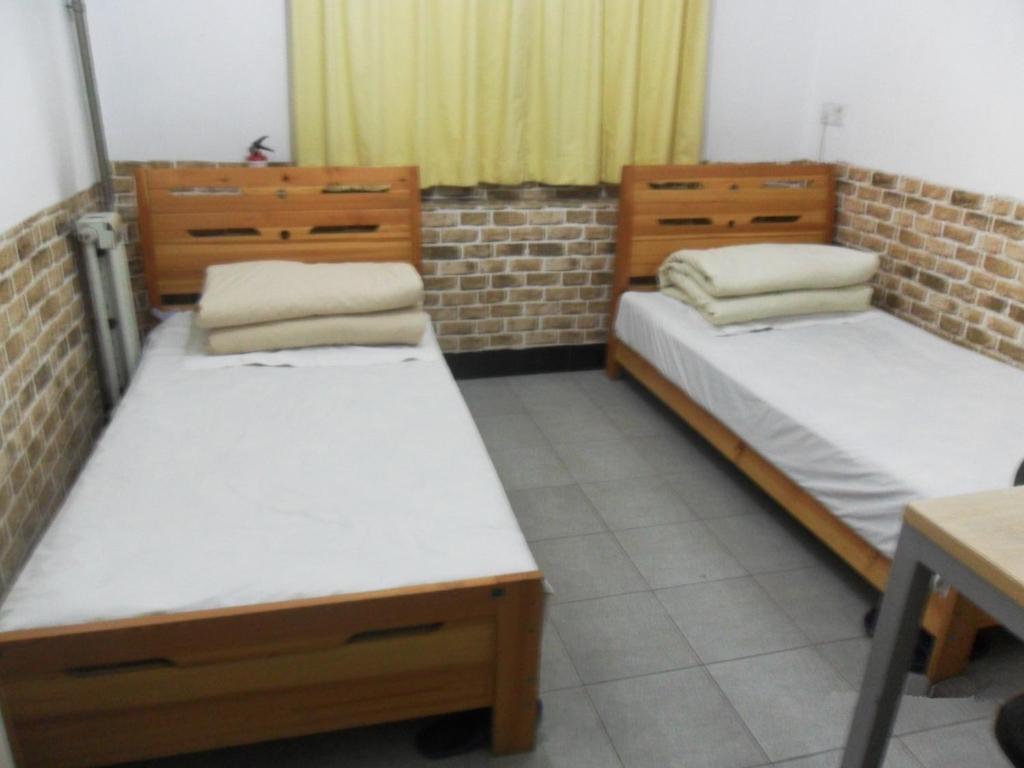 Discovery Youth Hostel Beijing Værelse billede