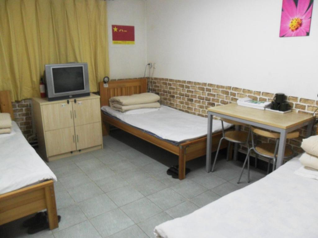 Discovery Youth Hostel Beijing Værelse billede